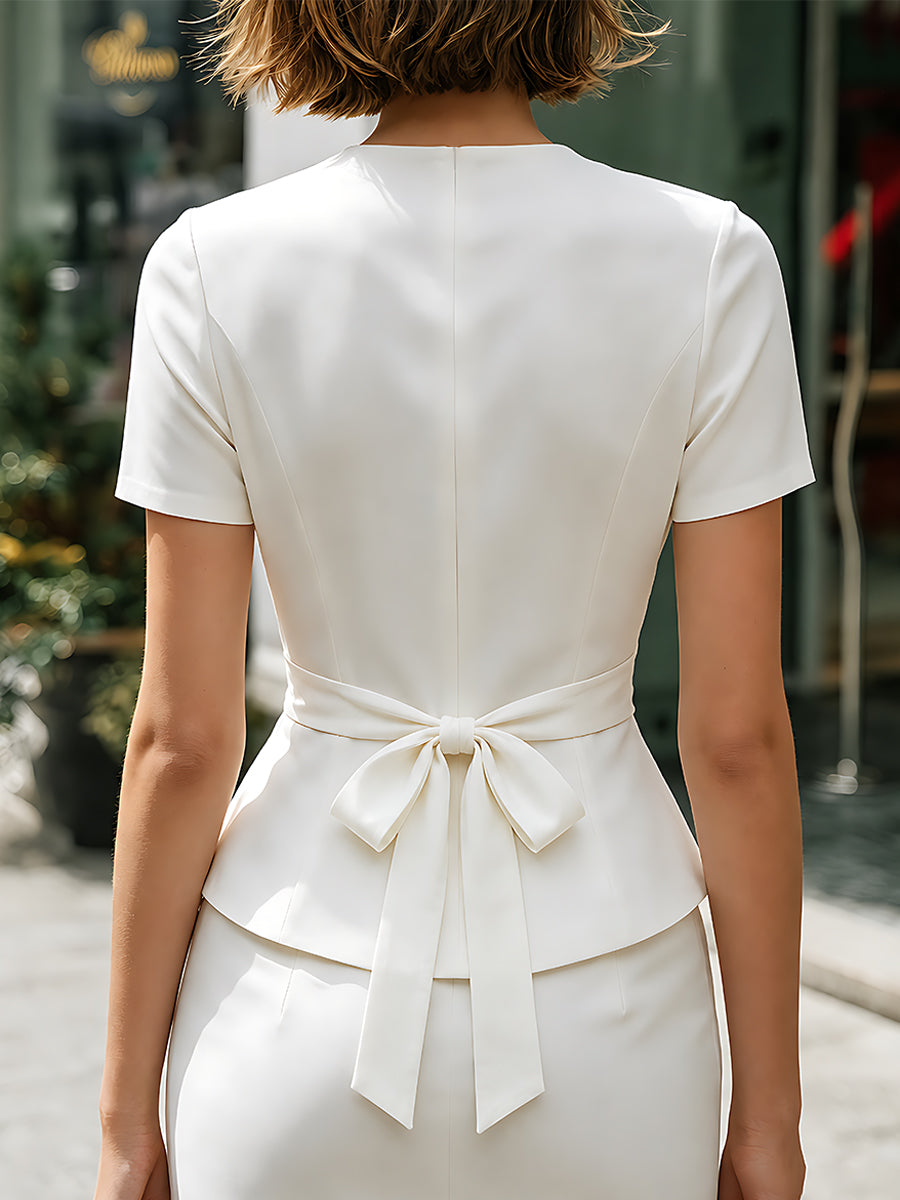 Floral Embroidered Wrap-Front Peplum Blouse