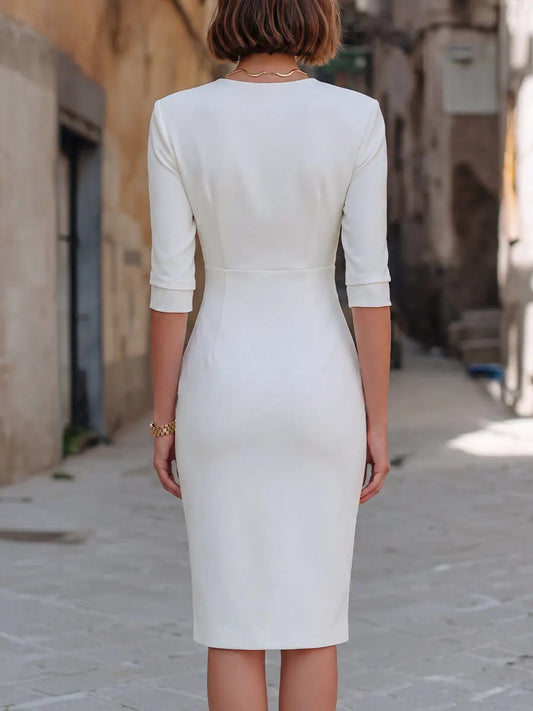 Robe midi fourreau asymétrique à encolure cache-cœur, décolleté en V et fermeture éclair dorée