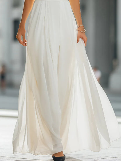 Pleated Halter Neck Maxi Dress with Flowing Skirt