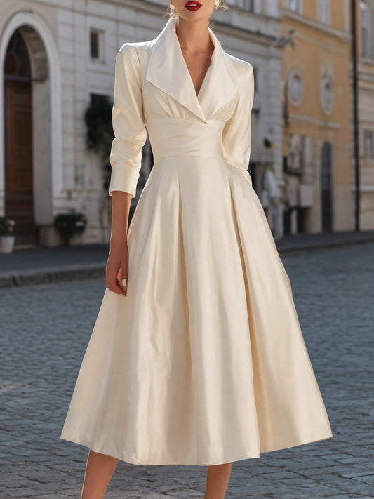 Élégante robe midi trapèze à col tailleur et manches 3/4