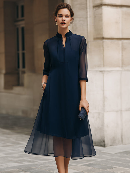 Robe mi-longue superposée transparente à col officier