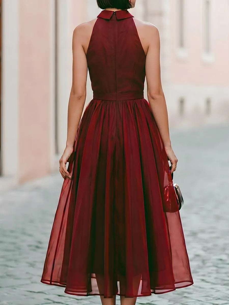 Elegant Sleeveless Halter Midi Dress With Flowing Skirt