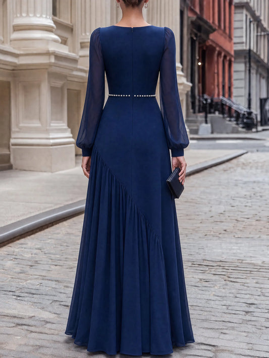 Robe longue asymétrique en mousseline ornée de perles