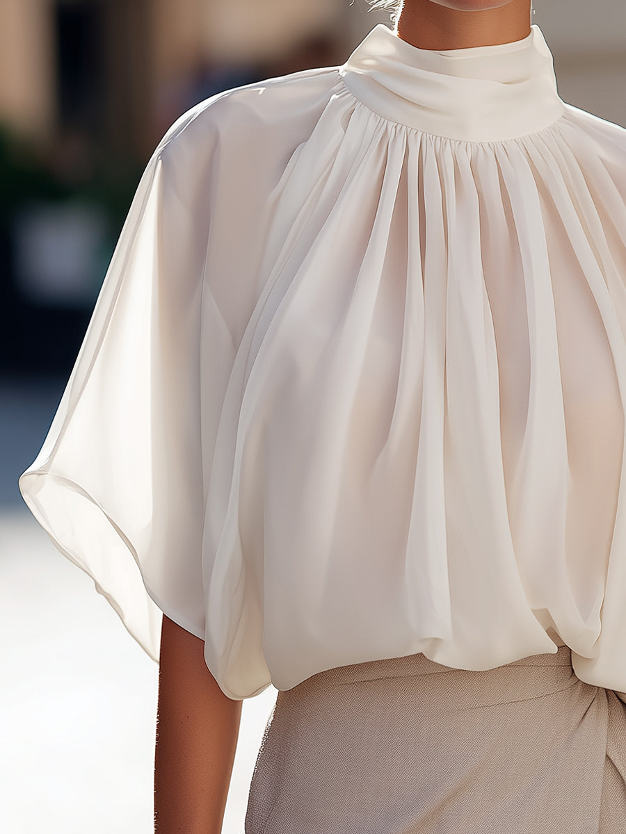 High-Neck Pleated Blouse With Voluminous Flutter Sleeves