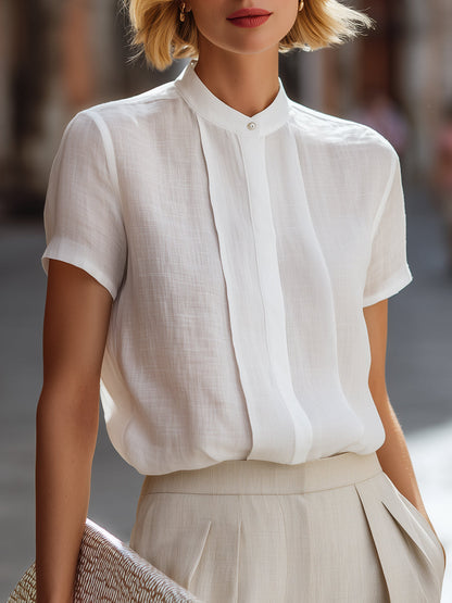 Structured Short Sleeve Stand Collar Blouse With Pleated Front Panel