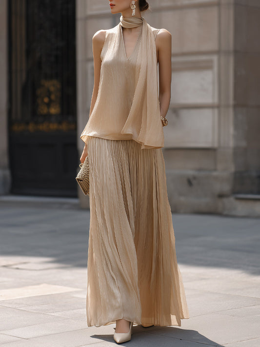 Draped Halter Top And Pleated Maxi Skirt Set With Flowing Silhouette