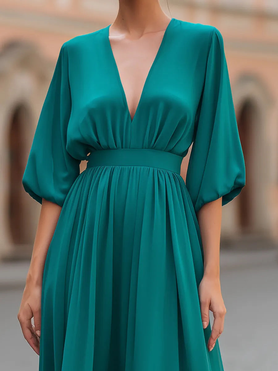 Deep V-Neck Gathered Waist Flowing Midi Dress
