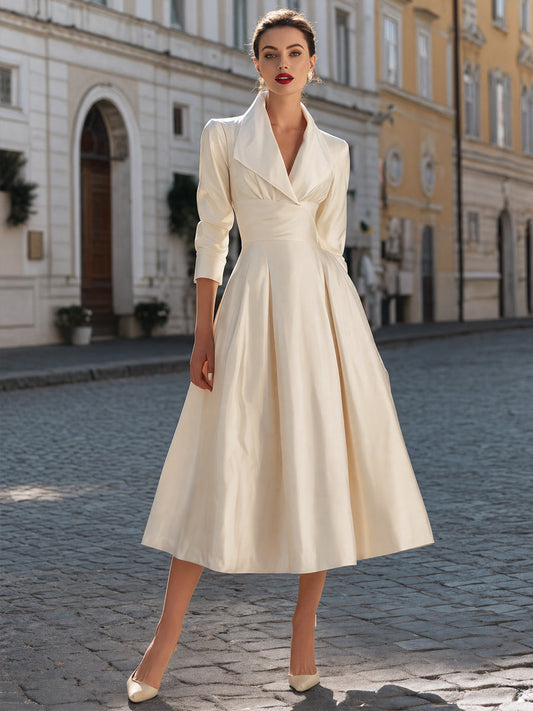 Élégante robe midi trapèze à col tailleur et manches 3/4