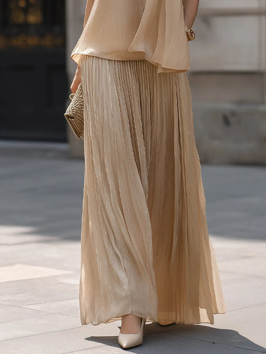 Draped Halter Top And Pleated Maxi Skirt Set With Flowing Silhouette