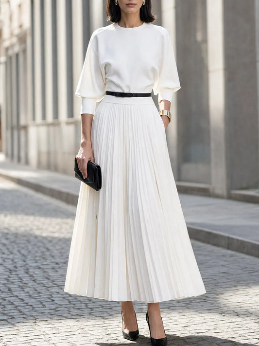 Vestido longo plissado de manga bufante e gola redonda