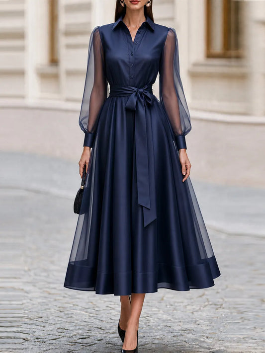 Robe chemise mi-longue en satin à manches transparentes en tulle avec ceinture à nouer pour une occasion formelle