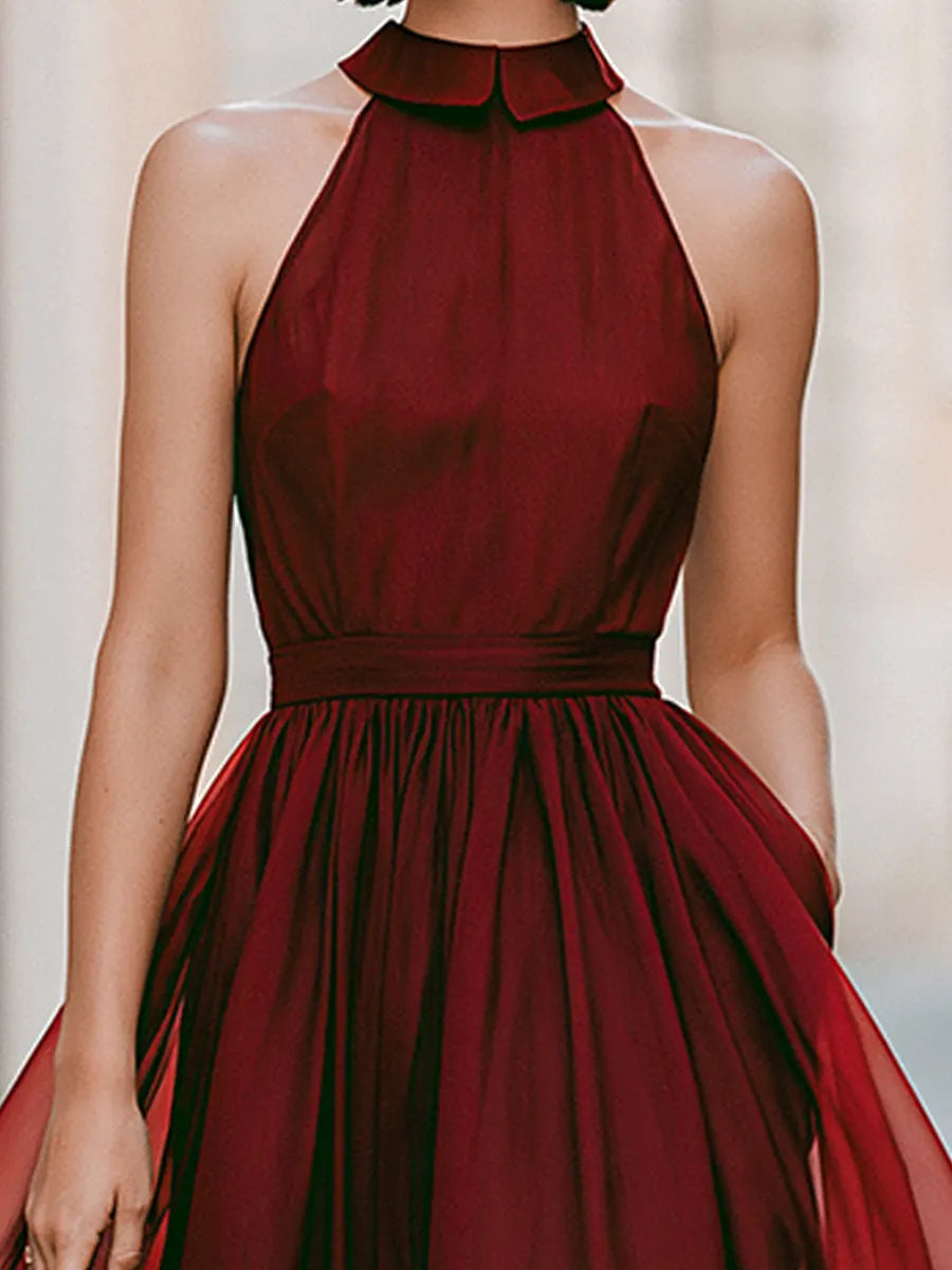 Elegant Sleeveless Halter Midi Dress With Flowing Skirt