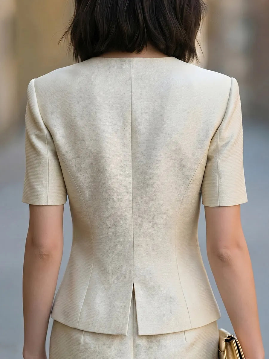 Elegant Wrap-Front Short Sleeve Top With Pearl Button Detail