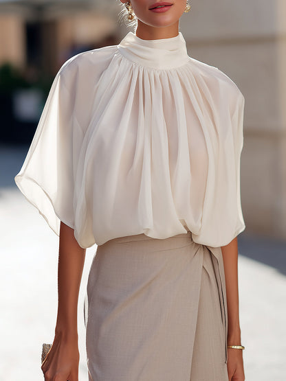 High-Neck Pleated Blouse With Voluminous Flutter Sleeves