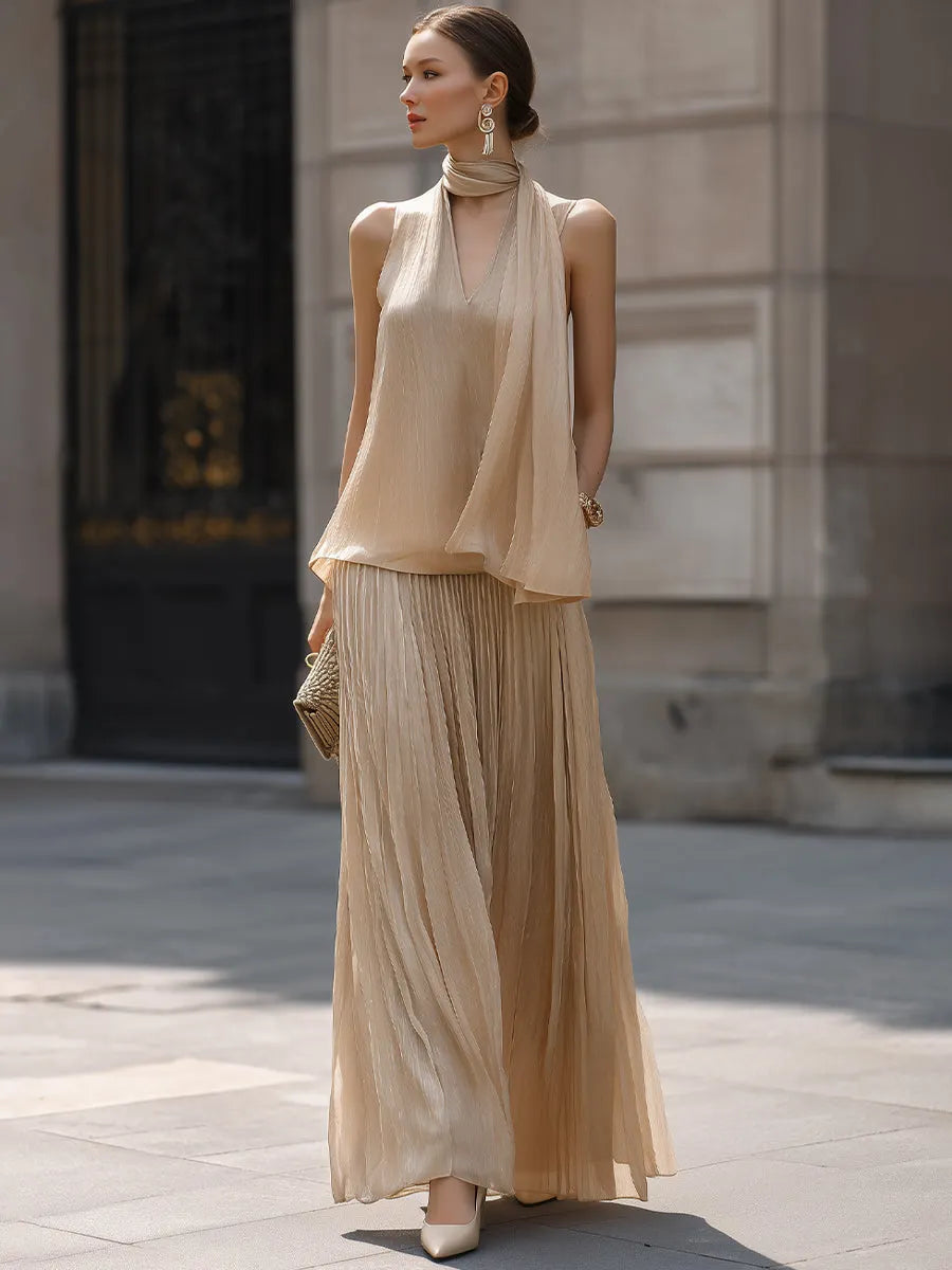 Draped Halter Top And Pleated Maxi Skirt Set With Flowing Silhouette