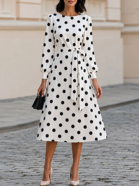 Robe midi trapèze ceinturée à col rond, manches ballon et motif pois