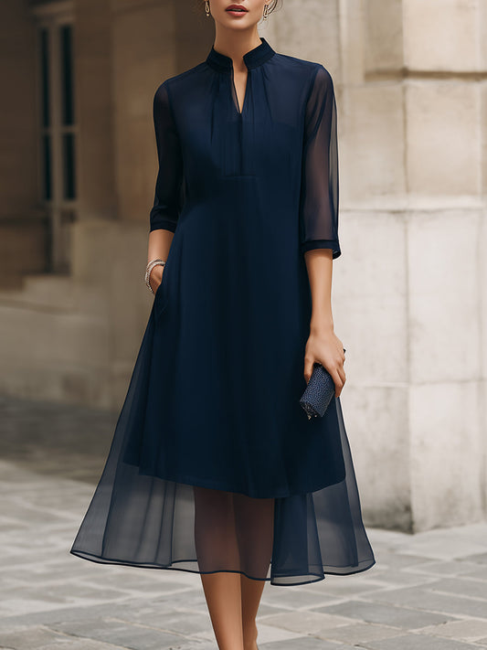 Robe mi-longue superposée transparente à col officier