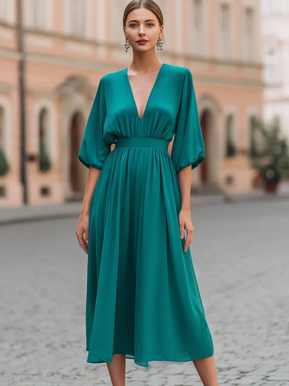 Deep V-Neck Gathered Waist Flowing Midi Dress