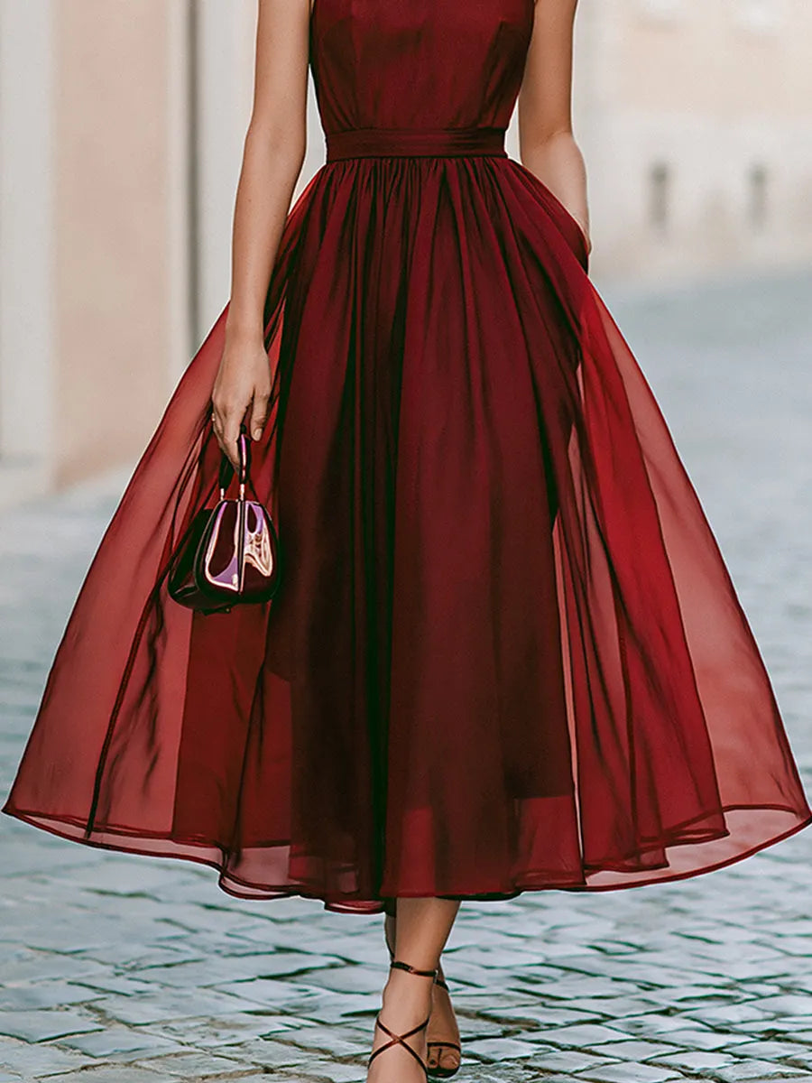 Elegant Sleeveless Halter Midi Dress With Flowing Skirt